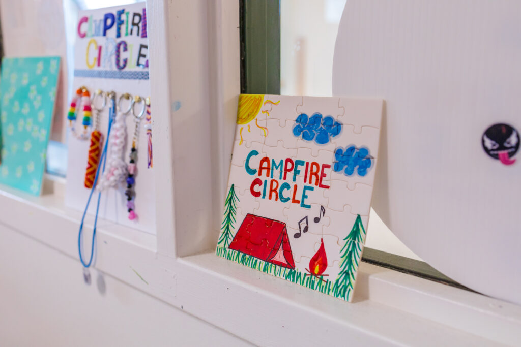 campfire circle artwork on a window ledge in the hospital