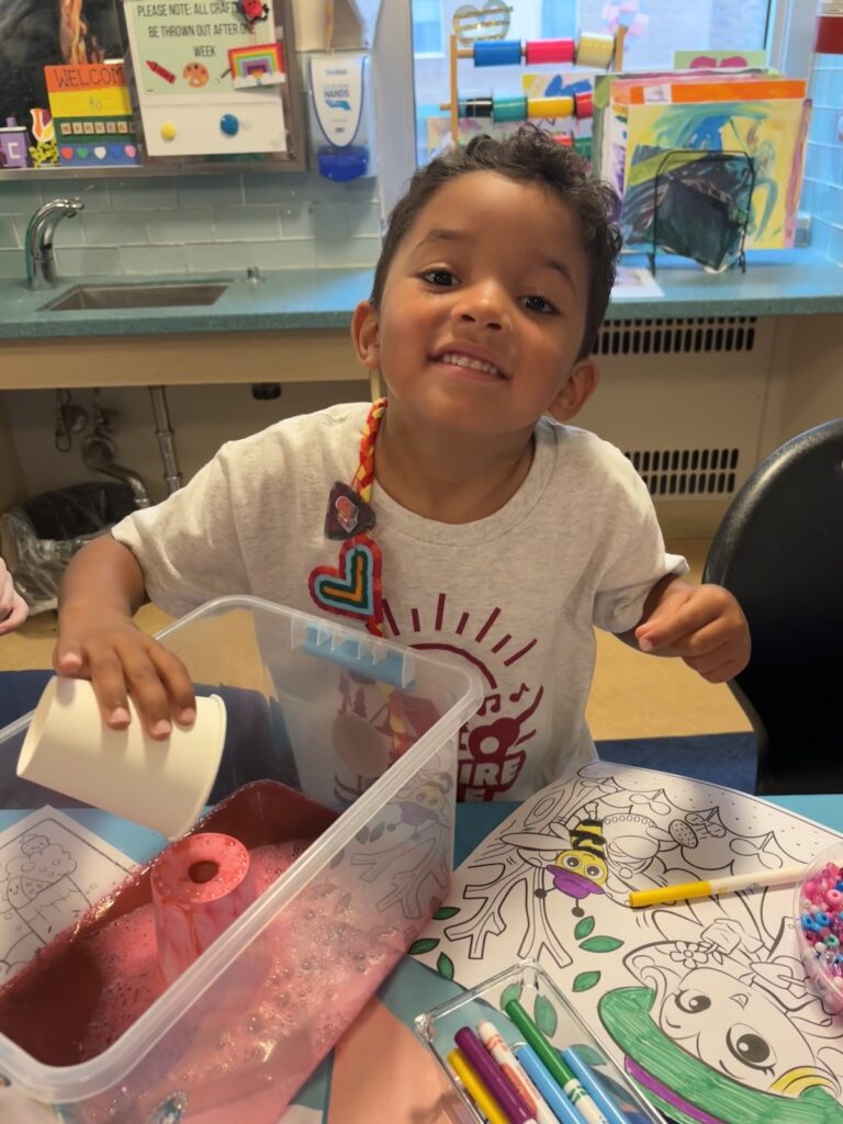 carter with arts and crafts in the hospital
