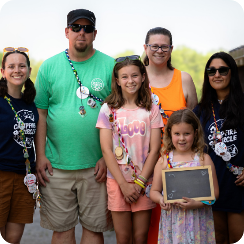 brooke with family and counsellors at camp