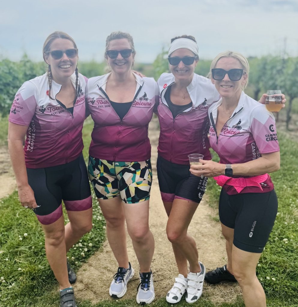 four bikers post ride
